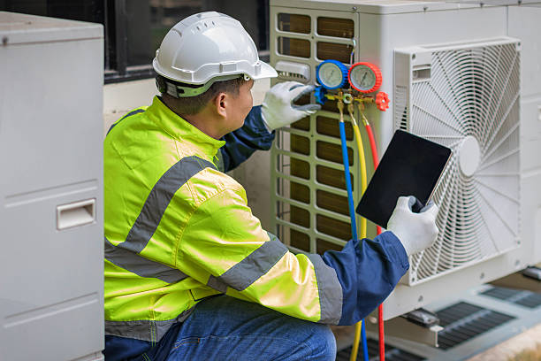 Professional Hvac technician working in Wales, WI